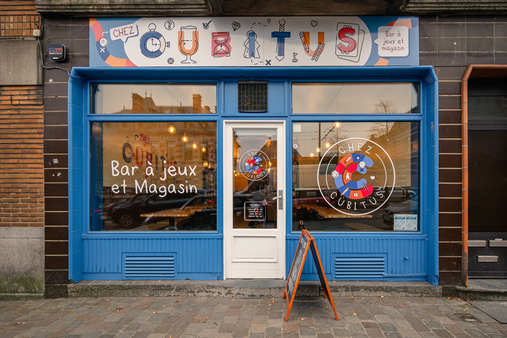 Chez Cubitus XL - Bar à jeux et Magasin photo